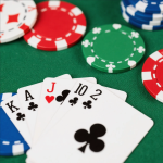 Online poker player analyzing opponents’ moves on a laptop screen